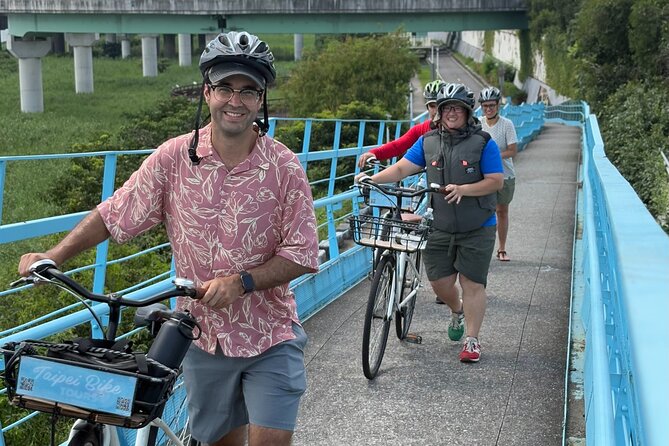 4 Hour Afternoon Cycling City Tour North with Snack - Dihua Street: a 19th-century riverside trading world