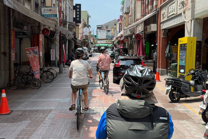 4 Hour Afternoon Cycling City Tour North with Snack - Dadaocheng Pier Plaza: the river path that makes biking feel easy