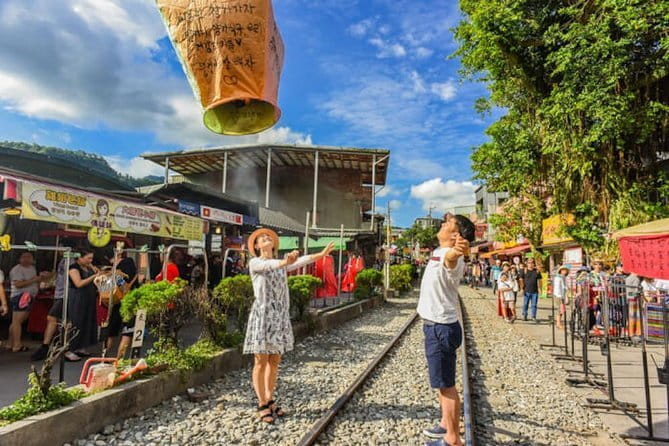 7-Hour Join tour - Jiufen Village & Shifen Town - Shifen Old Street by train tracks: where the day turns cinematic