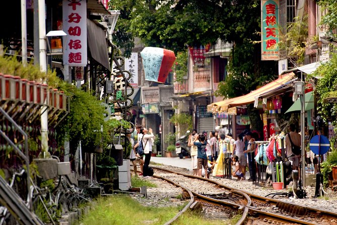 Private Jiufen & Pingxi Day Tour with English-Speaking Guide - Shifen Waterfall: A Short Reset Before Lanterns